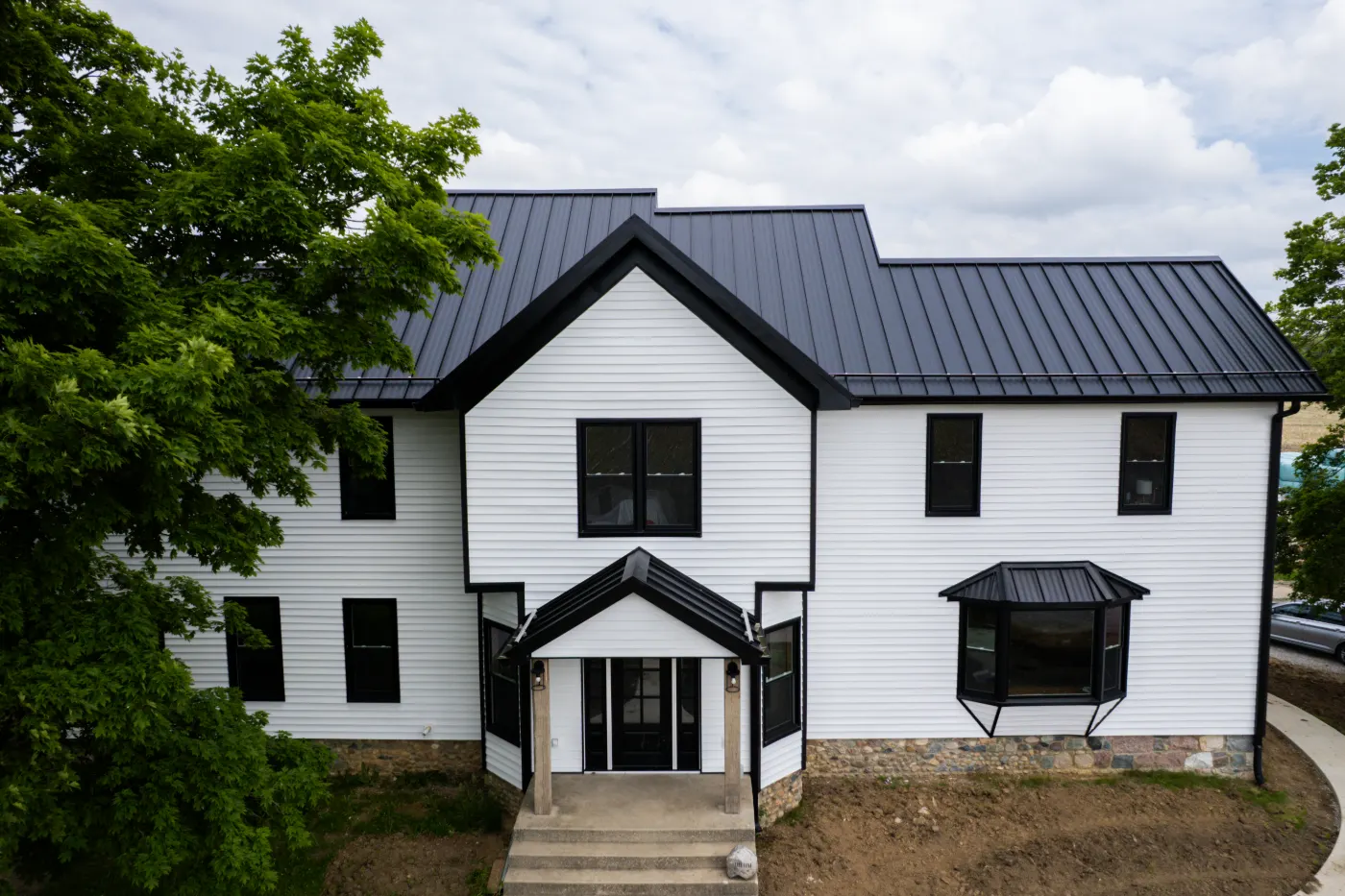 Manufacturer-certified roof installation in Clay Corner